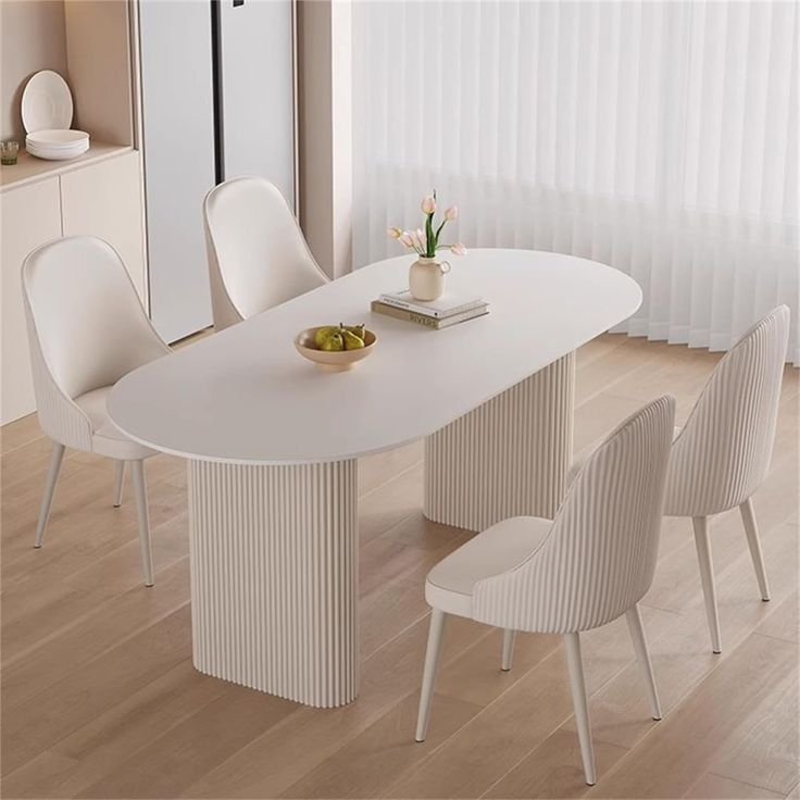 Marble-Dining-Table-White-Chairs-Set-of-4-Fluted-Oval-Dining-Table-Contemporary-Kitchen-Dining-Room.jpeg